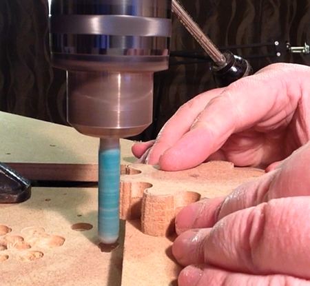 Steel bar with glued sandpaper makes a nice drum sander